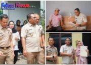 Kanwil BPN Sumut Menyerahkan Sertipikat PTSL Door to Door kepada Masyarakat Kelurahan Sukamaju dan Gedung Johor