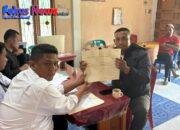 Kantor Pertanahan Kabupaten Tapanuli Utara Laksanakan Penyerahan Sertipikat PTSL di Desa Harianja